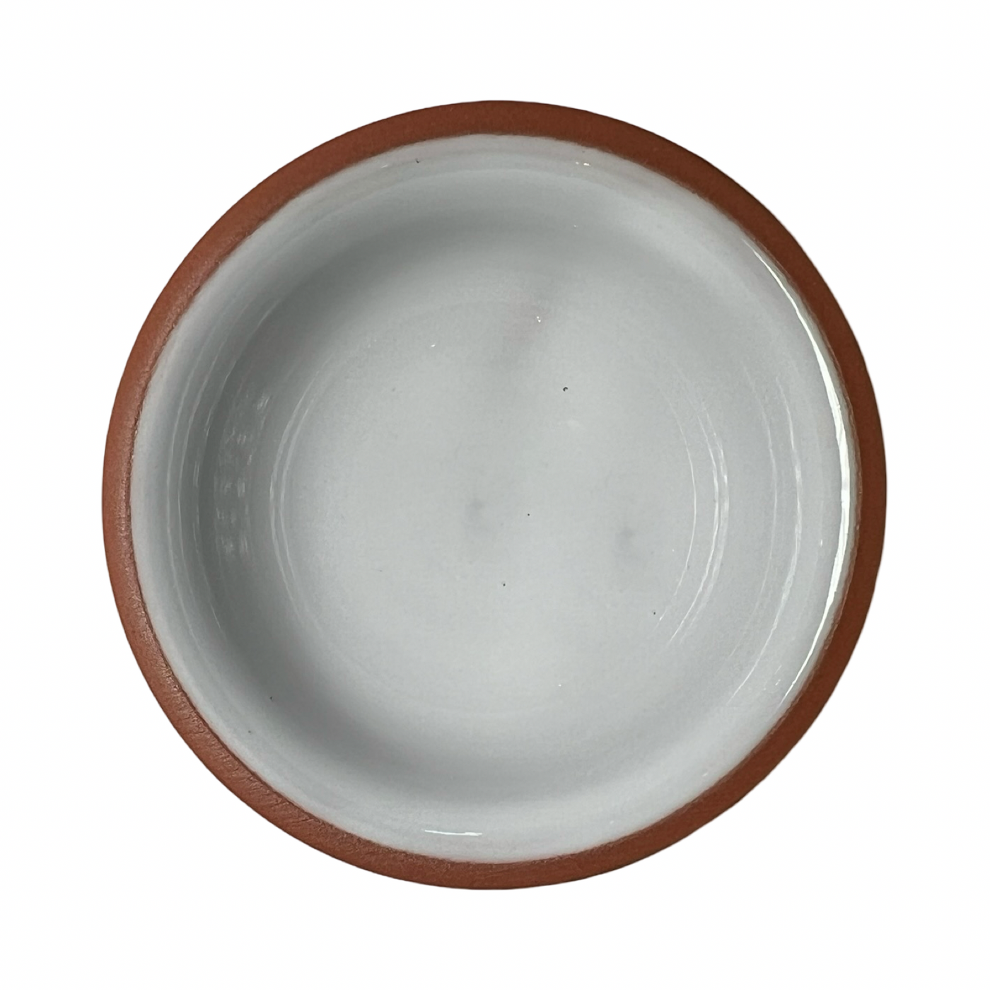 terracotta pinch bowls with an unglazed exterior and glazed interiors in white