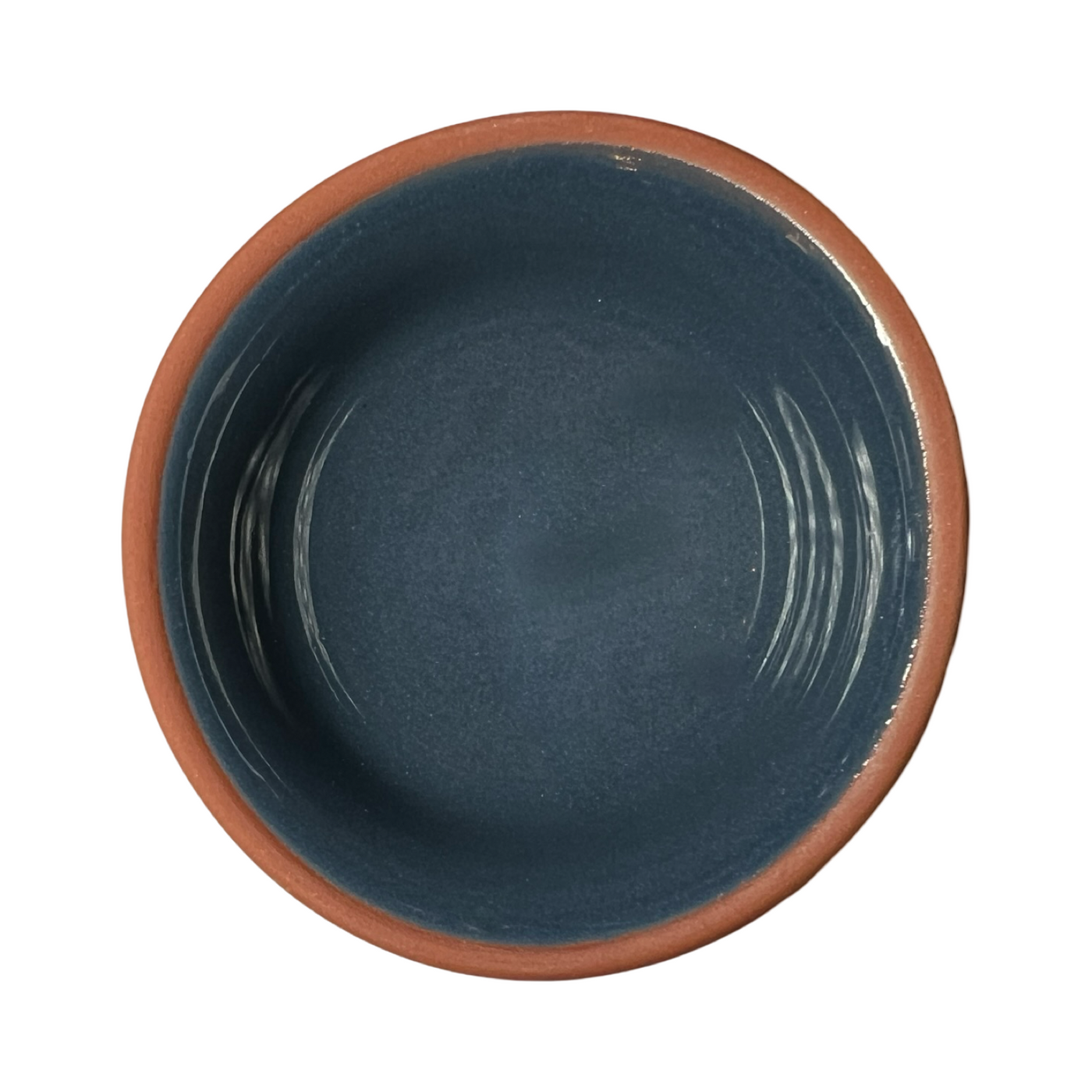 terracotta pinch bowls with an unglazed exterior and glazed interiors in slate blue