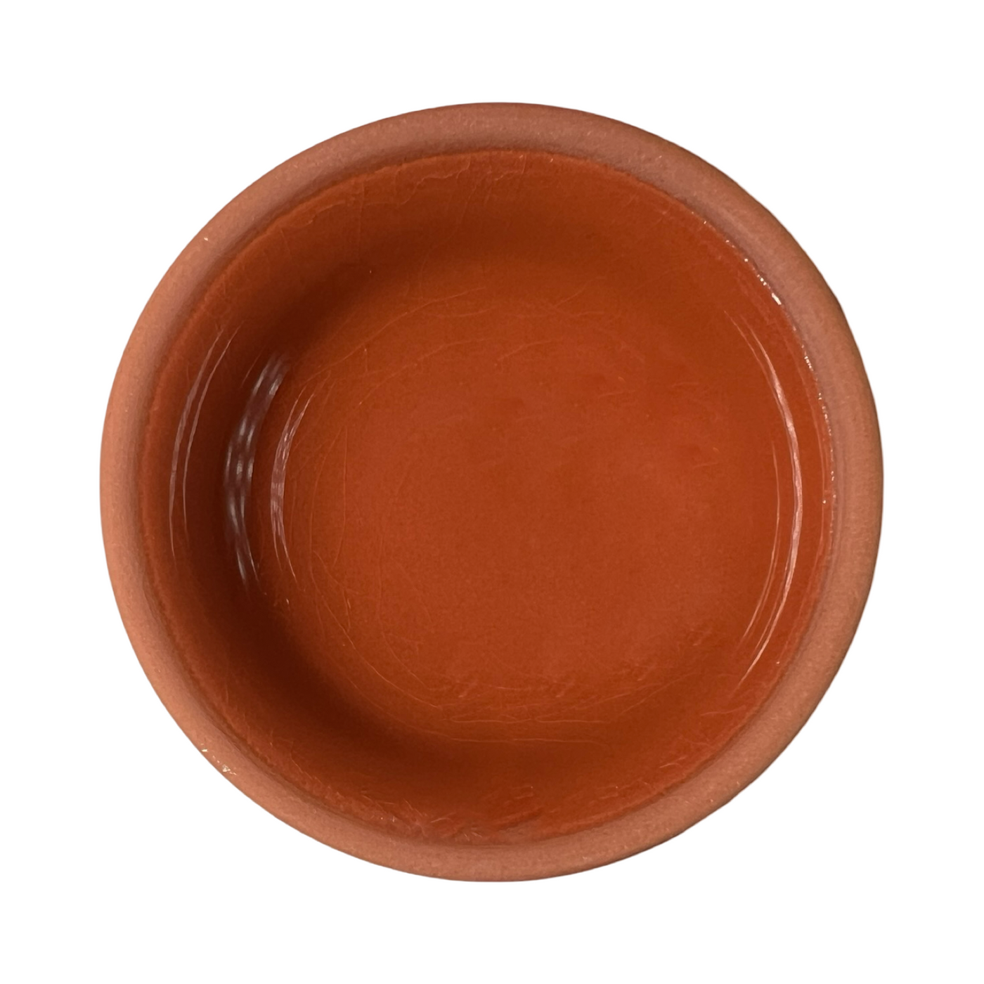 terracotta pinch bowls with an unglazed exterior and glazed interiors in orange