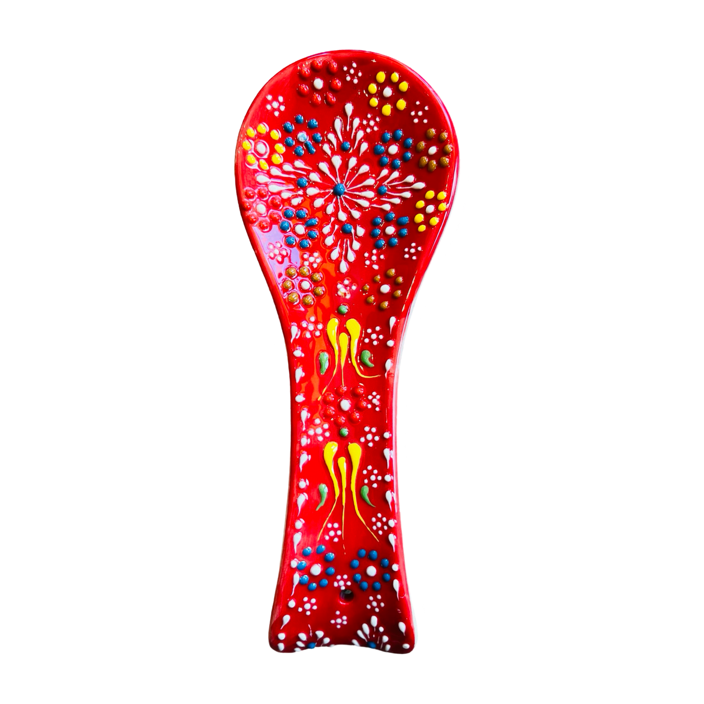 red spoon rest with a multi-color design