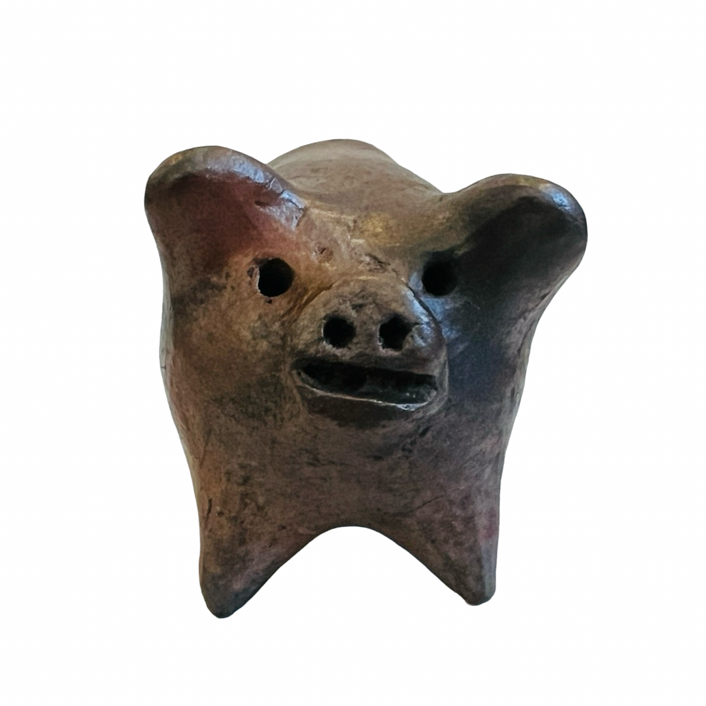 front view of dark brown clay pig