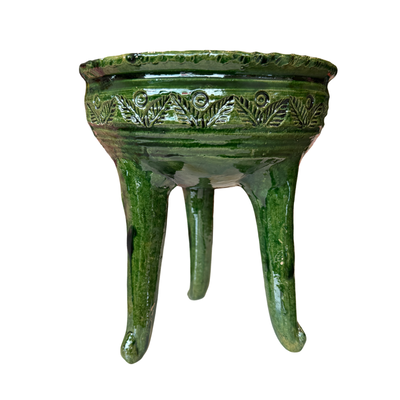 Green ceramic copalero featuring a stamped design.
