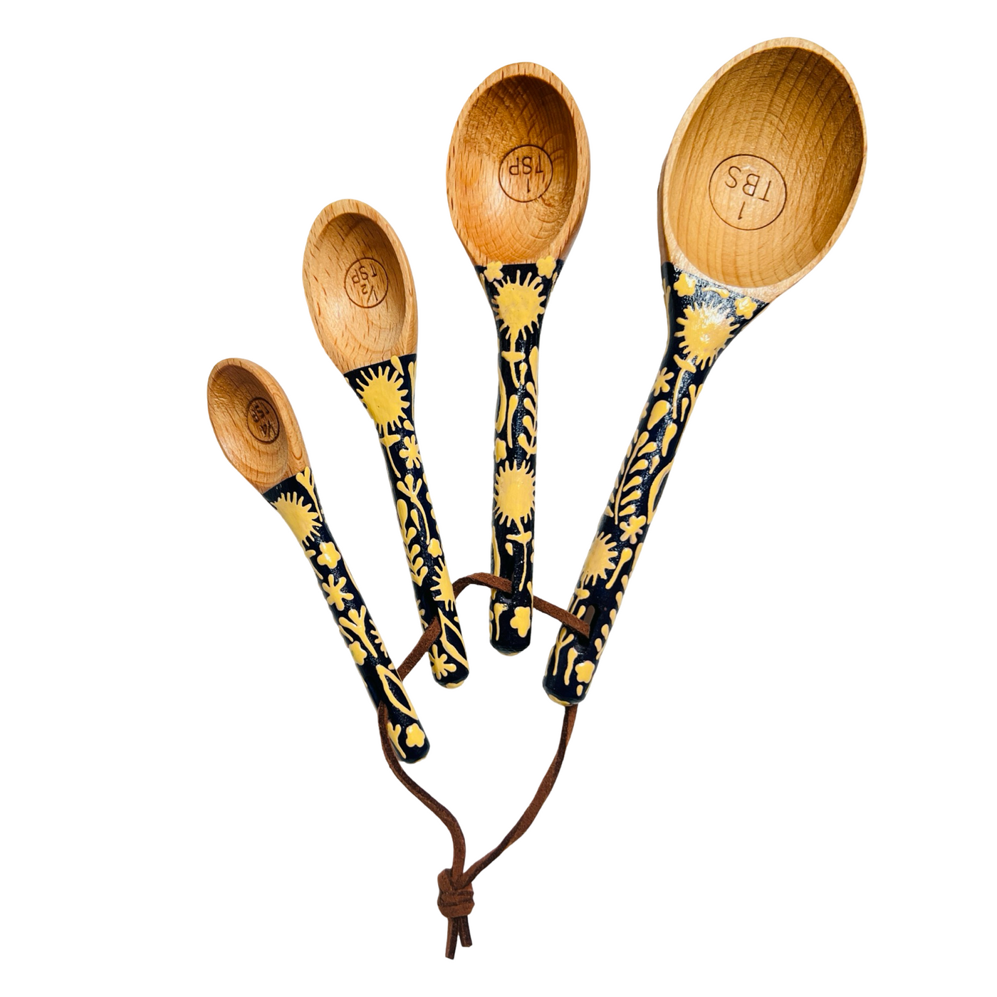 set of wooden measuring spoons with handpainted handles with a navy blue and light yellow design.