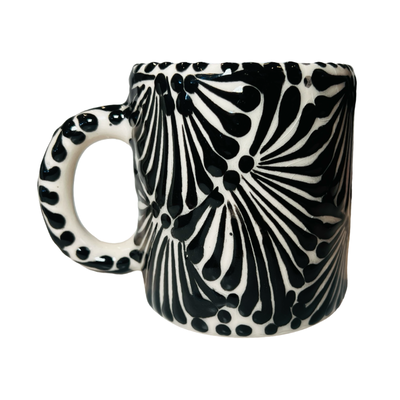 mug with a black and white Puebla design