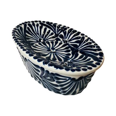 top  view of a soap dish with a black and white Puebla design