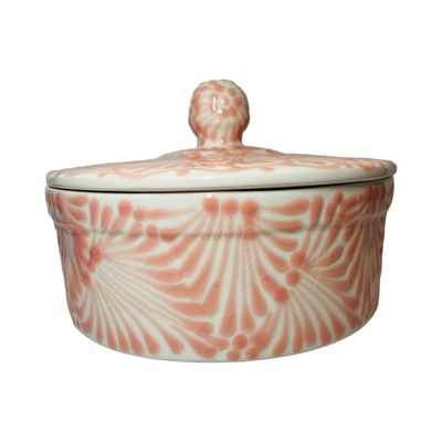 ceramic tortilla warmer with a coral and white Puebla design