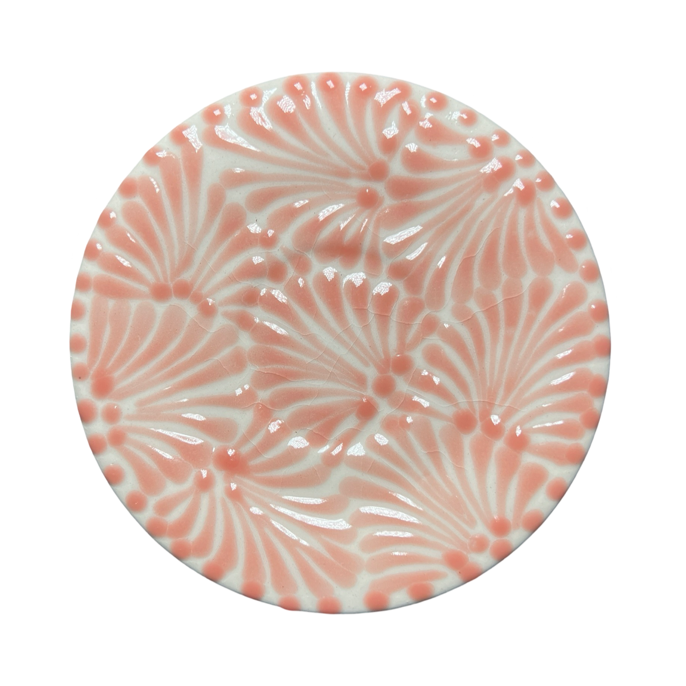 round plate with a coral and white Puebla design