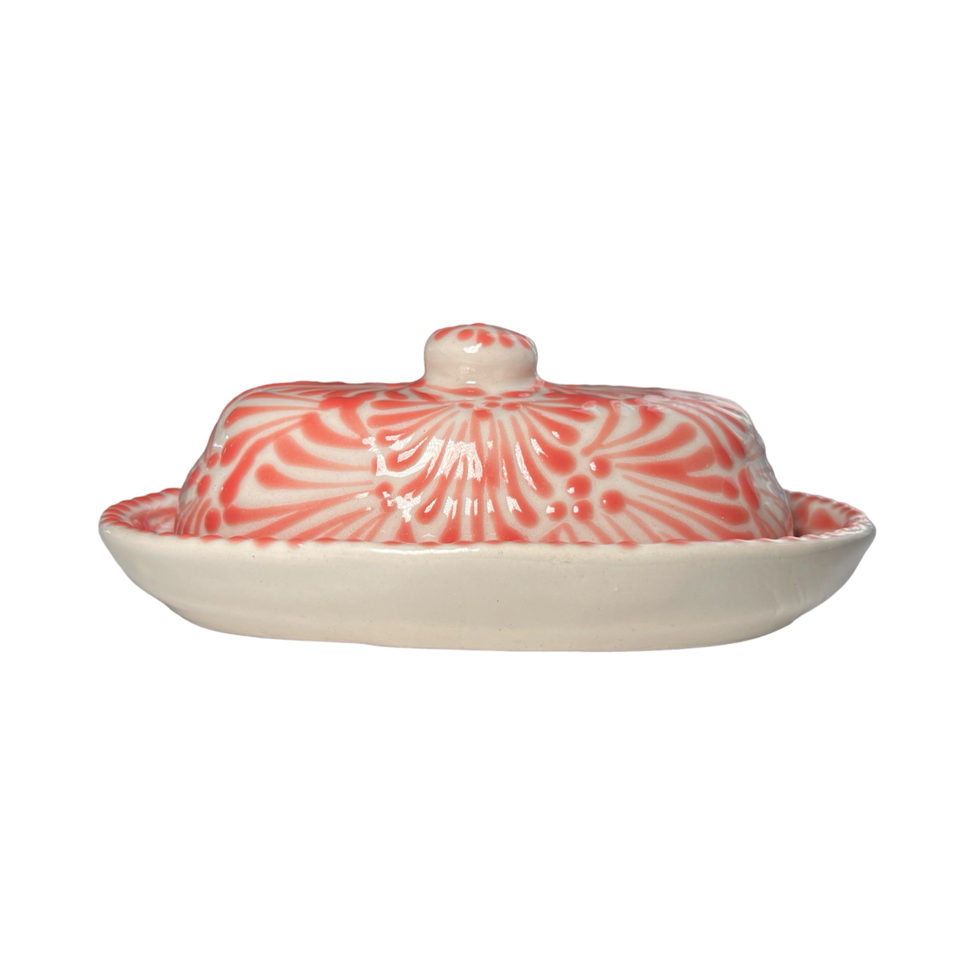 butter dish with lid in a coral and white Puebla design