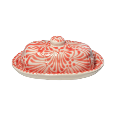 butter dish with lid in a coral and white Puebla design