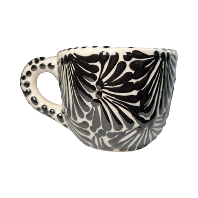 mug with a black and white Puebla design