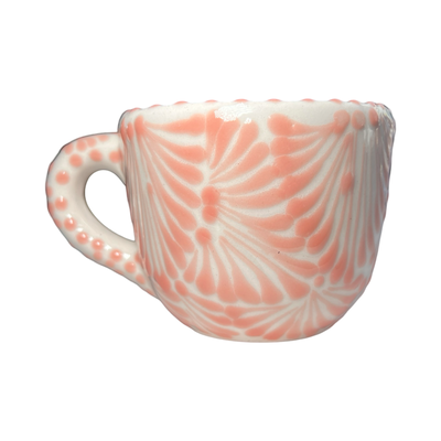 mug with a coral and white Puebla design