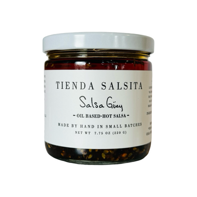 7.75 oz clear jar of Salsa Guey from Tienda Salsita with a white branded label and lid.