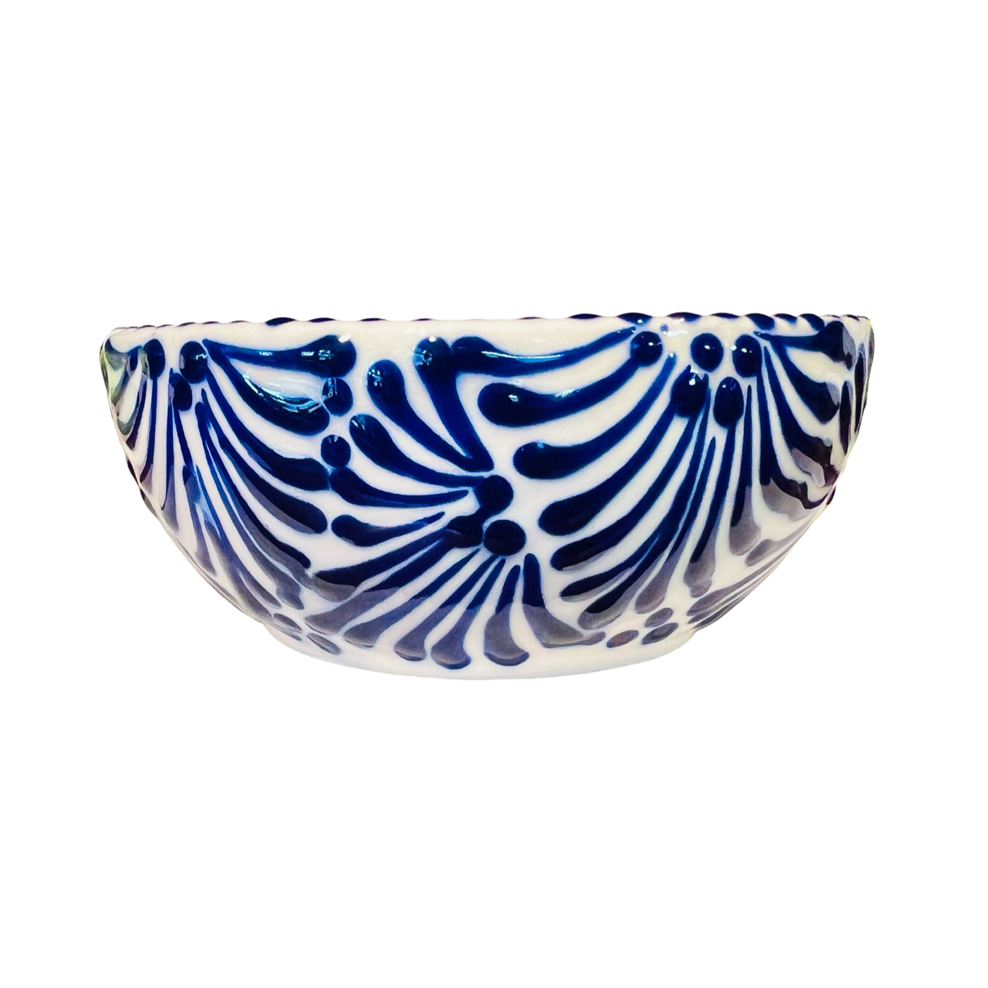 small ceramic bowl with a blue and white Puebla design