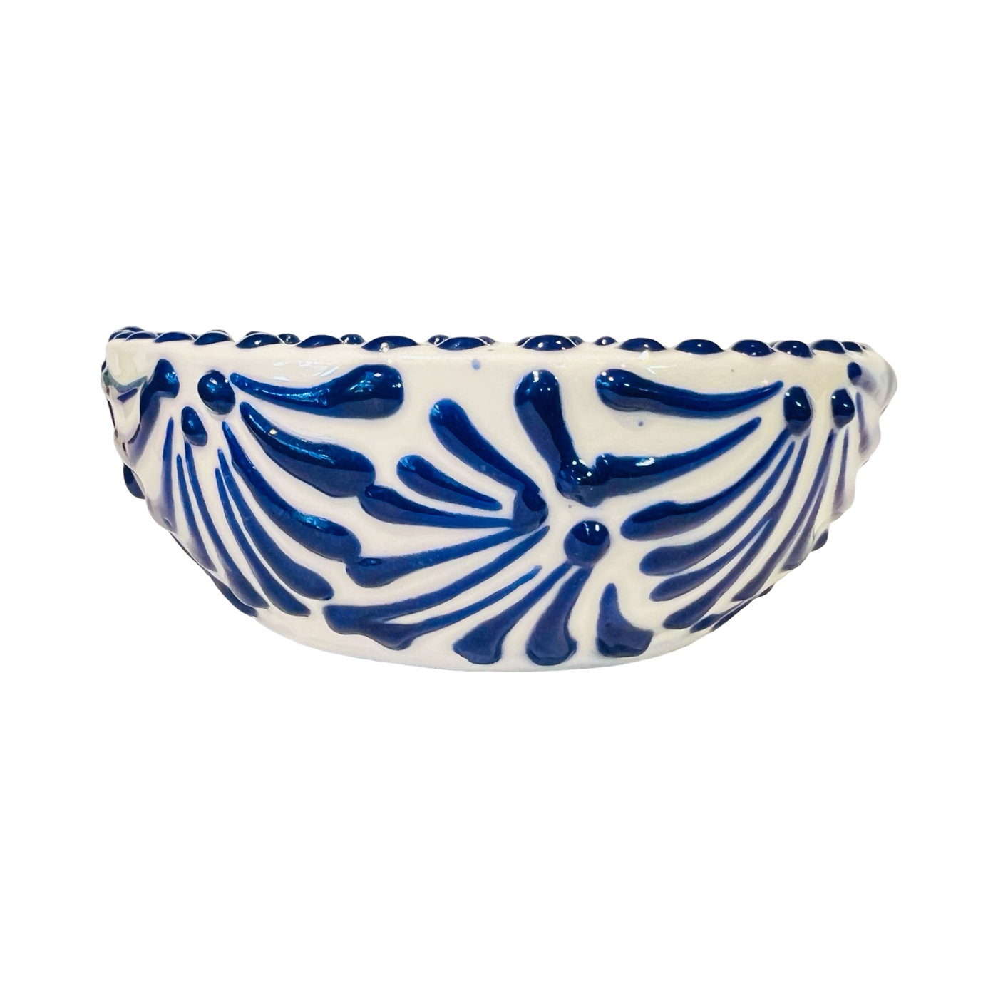 small ceramic bowl with a blue and white Puebla design