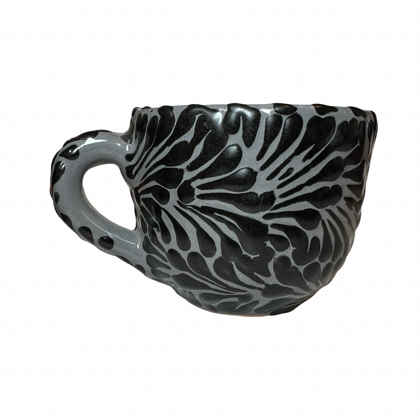 ceramic mug with a black and gray Puebla design