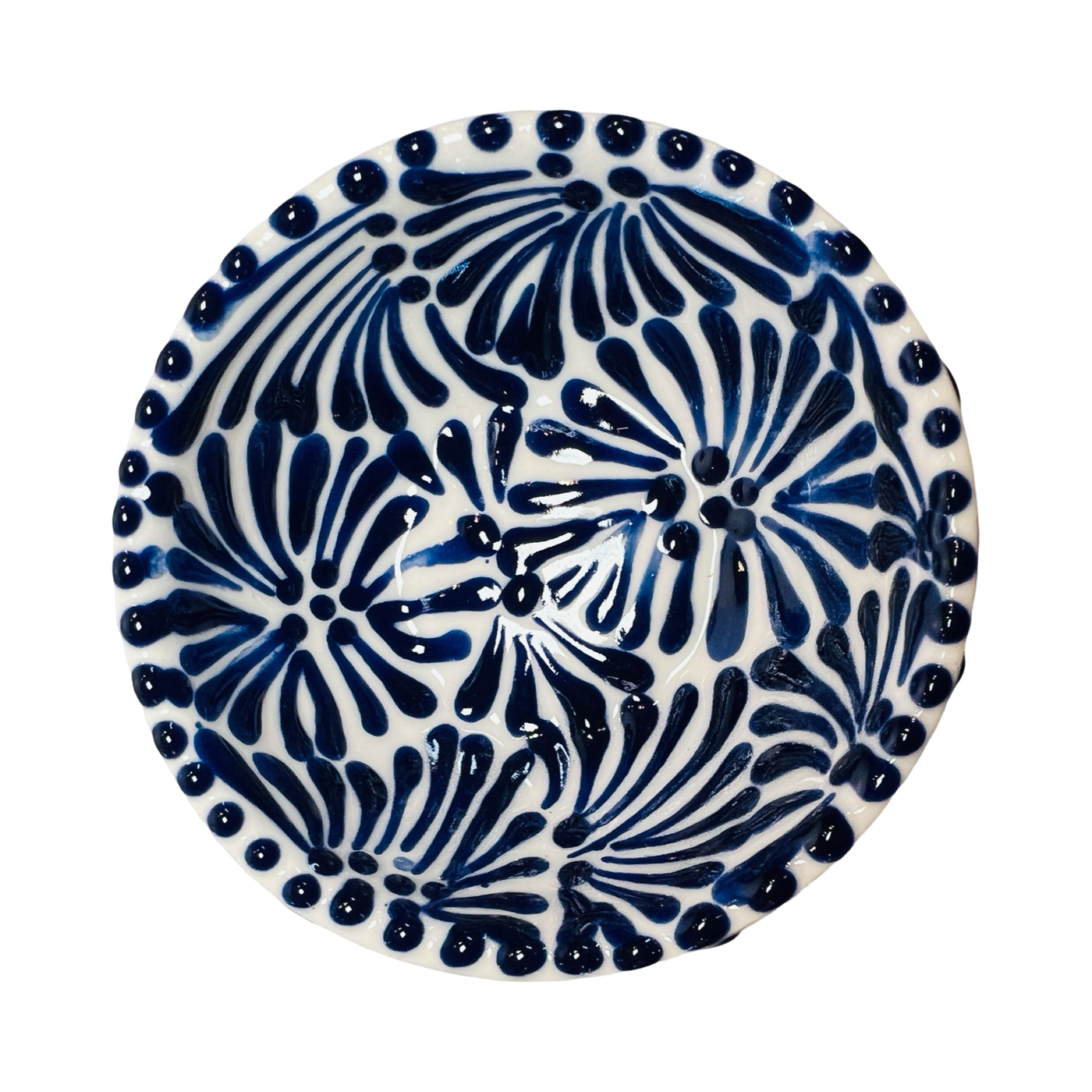 top view of a ceramic bowl in a blue and white Puebla design