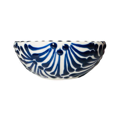 ceramic bowl in a blue and white Puebla design