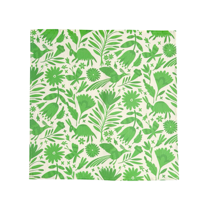 cream towel with a green otomi design.