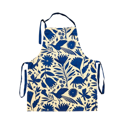 Apron featuring a blue Mexican otomi design with blue neck and waist ties.