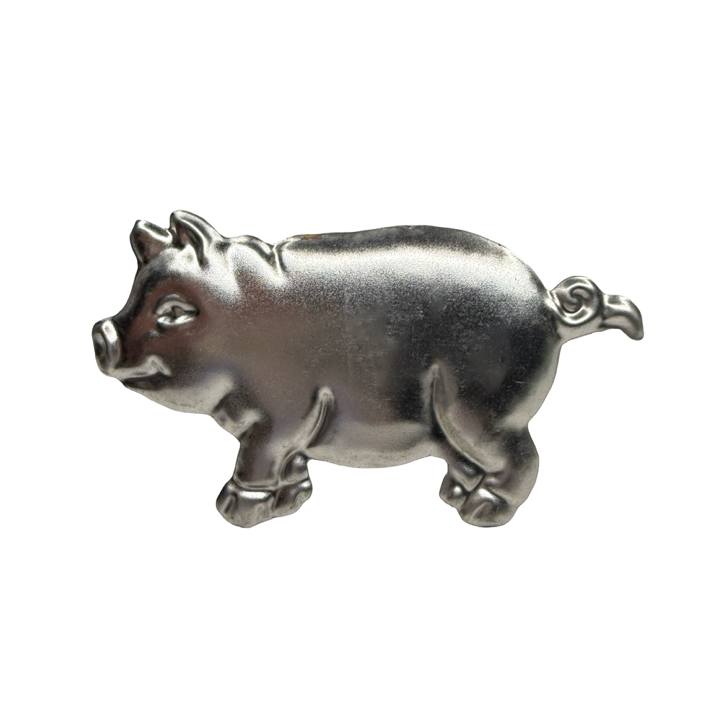 Metal napkin ring shaped like a small pig, shown in a side profile.