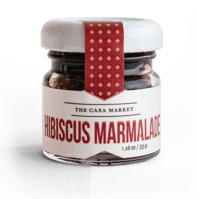 Mini Hibiscus Marmalade in branded glass jar with lid.