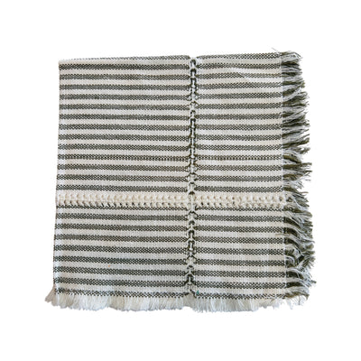 Striped natural and olive green handwoven napkin quarter folded