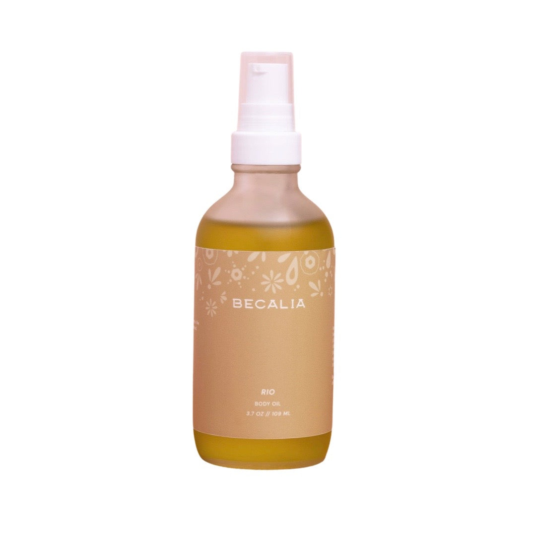 3.7 oz frosted bottle of body oil in a peach colored branded label