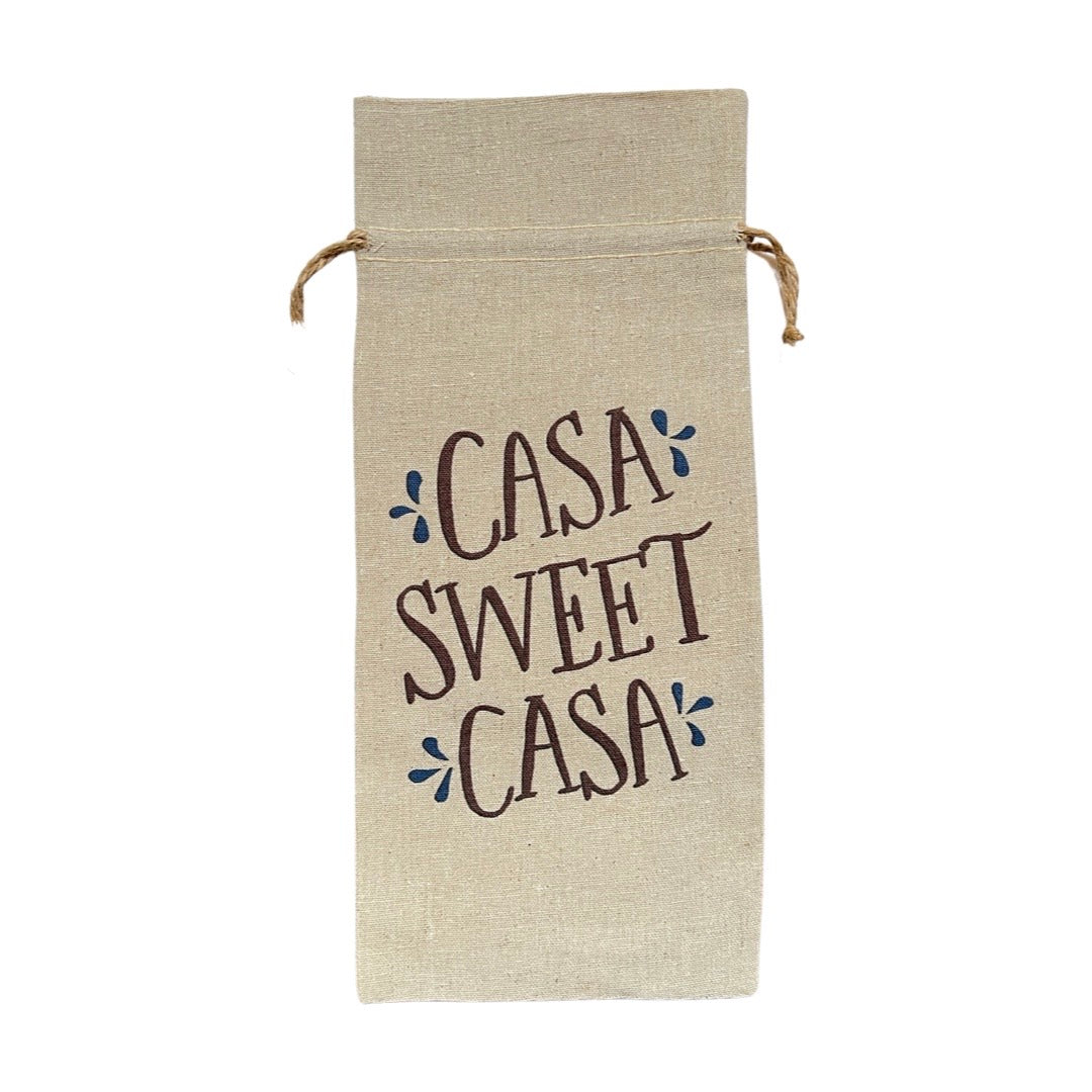 Beige linen wine bottle bag with the phrase Casa Sweet Casa in brown lettering and blue accents. 