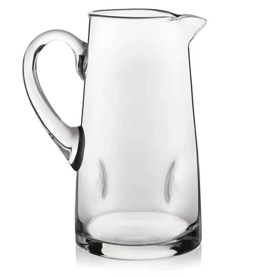 Clear glass pitcher with a wide handle, easy-pour spout, and subtle indented sides for grip.