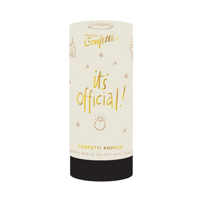 Cylindrical confetti popper labeled “It’s Official” with a gold ring illustration and small celebratory icons.
