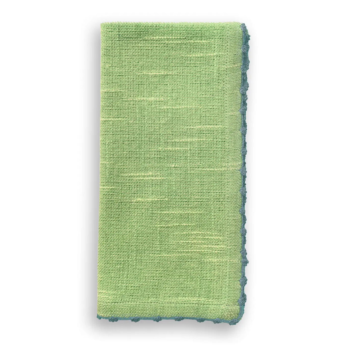 Folded fern green cotton napkin with a hand-knotted green trim along the edge.