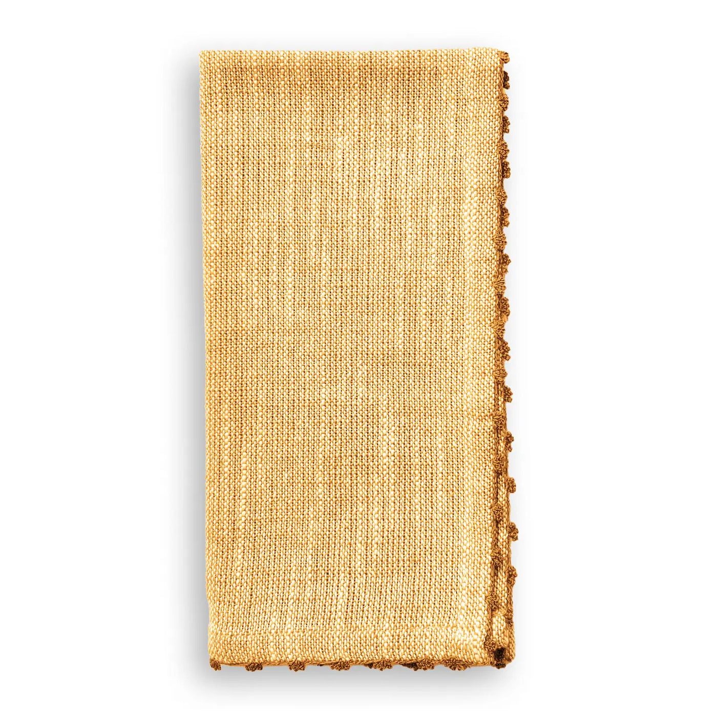 Folded ochre-colored cotton napkin with hand-knotted ochre trim detail along the edge.