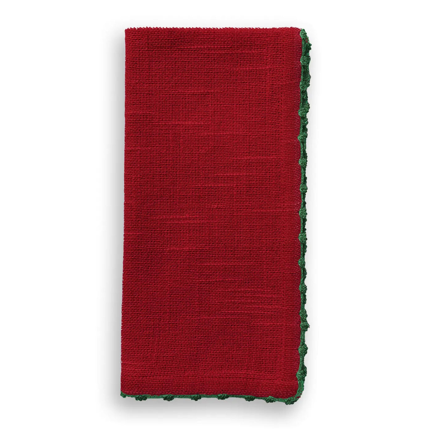 Folded scarlet red cotton napkin with green hand-knotted trim detail along the edge