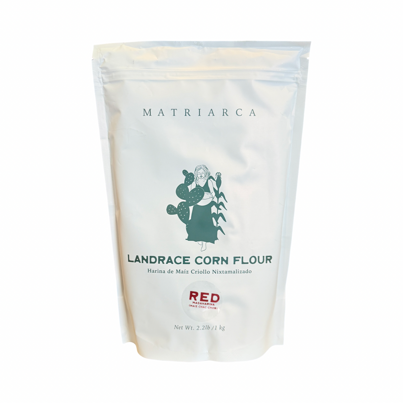 2.2lbs White resealable pouch labeled “Matriarca Landrace Red/Rojo Corn Flour,” featuring a green illustration of a woman with corn and a cactus.