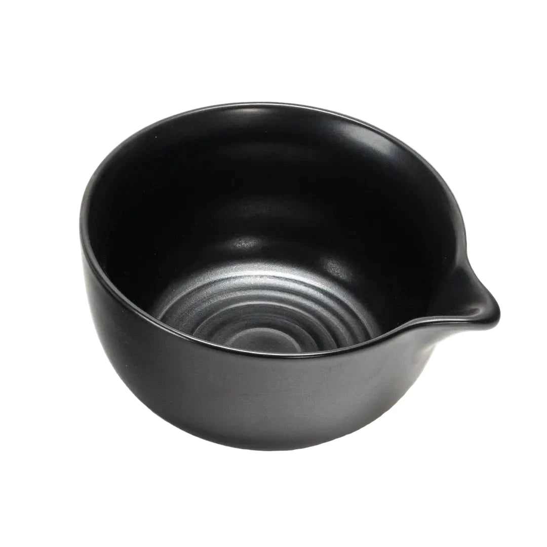 top view of a round matte black matcha bowl.