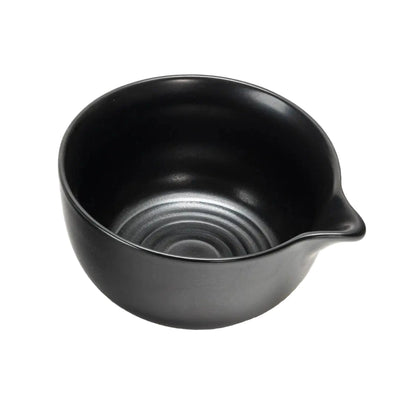 top view of a round matte black matcha bowl.