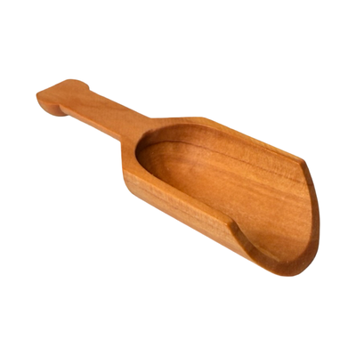 Small wooden scoop with a smooth finish and short handle.