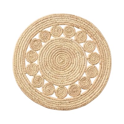 Round woven charger made from natural date palm leaves with a detailed circular pattern.
