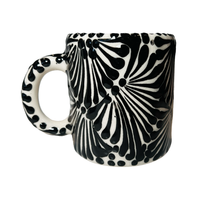 mug with a black and white Puebla design