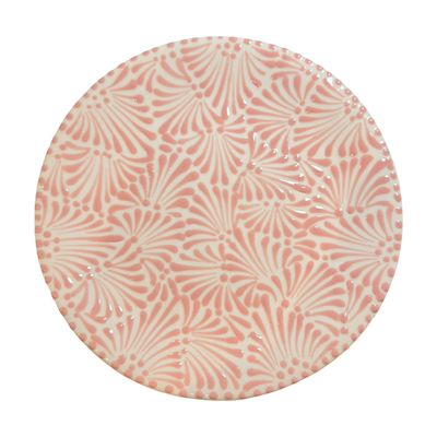 round plate with the Puebla signature pink and white glazed talavera design.