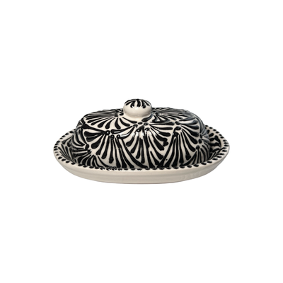 butter dish with lid in a black and white Puebla design