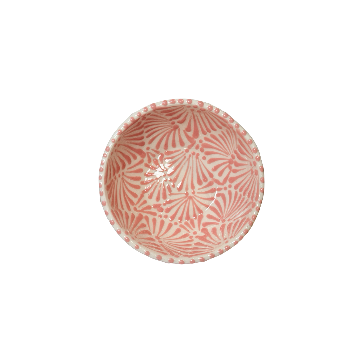 top view of a bowl with the Puebla signature pink and white glazed talavera design.