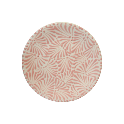 round plate with the Puebla signature pink and white glazed talavera design.