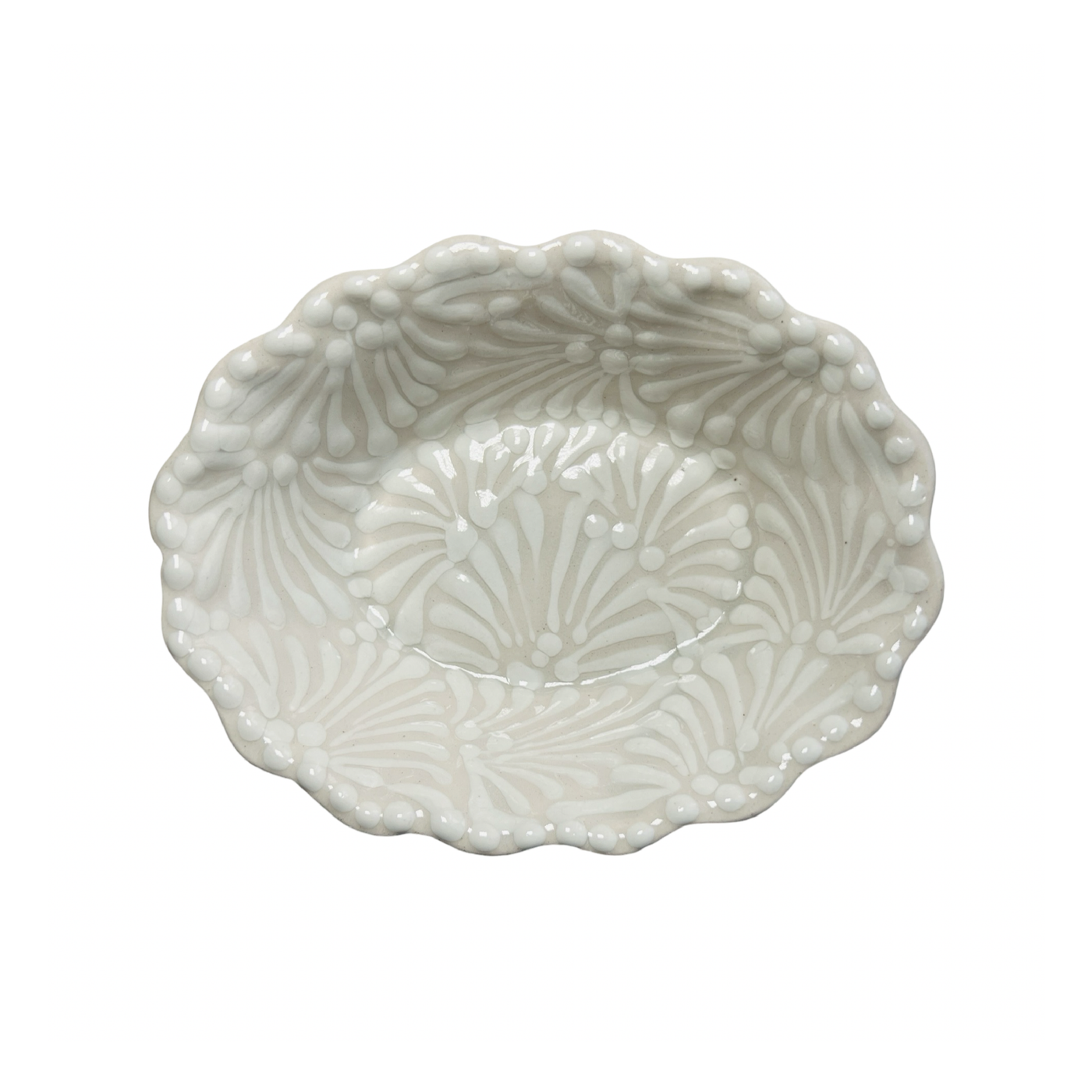 A handcrafted ceramic bowl with a scalloped rim and a cream and white glazed design.
