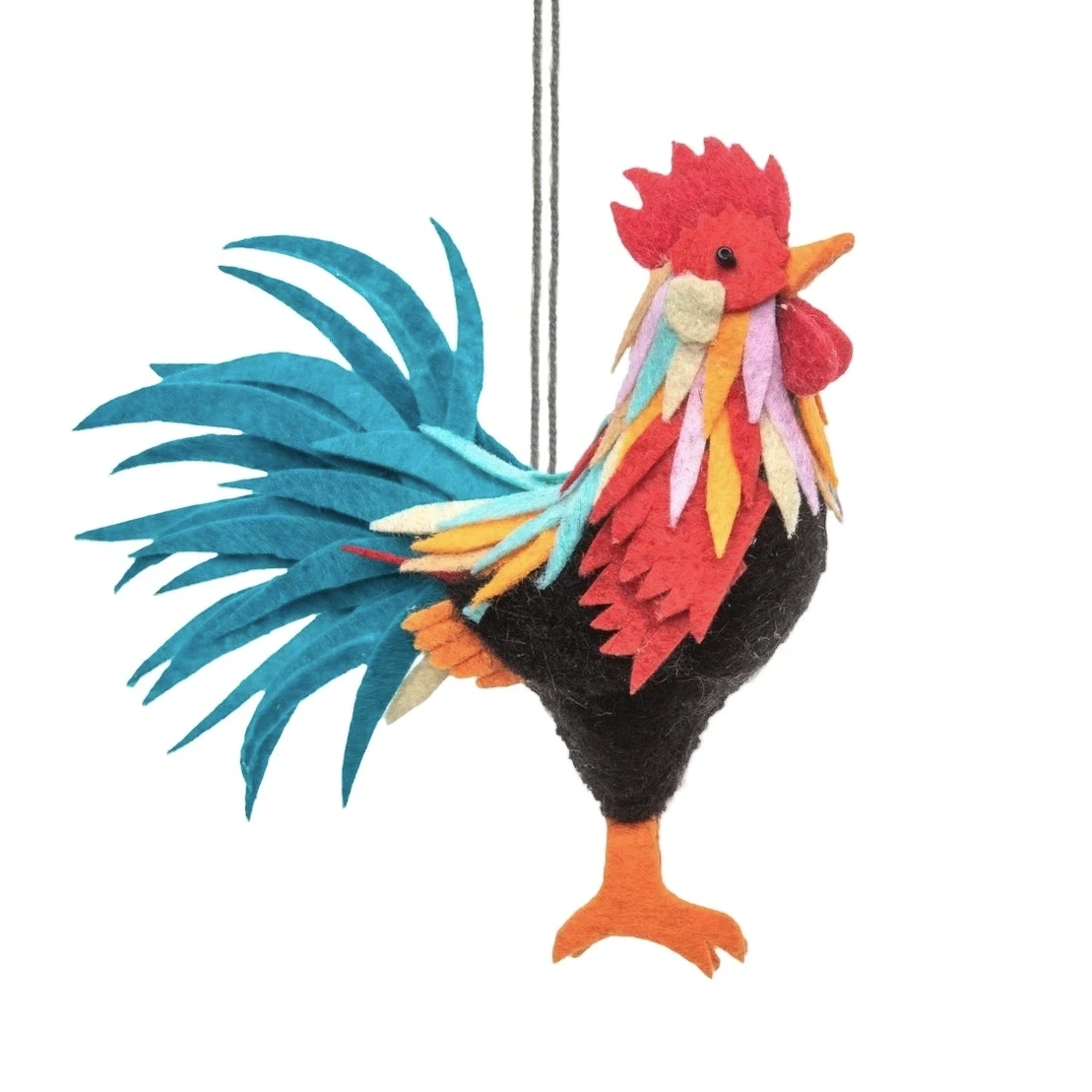 Colorful felt rooster ornament with layered teal tail feathers, multicolor plumage, red comb, and hanging loop.