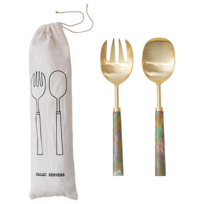 Set of two gold salad servers with pink and green marbled resin handles, shown with a linen drawstring bag labeled “Salad Servers.”