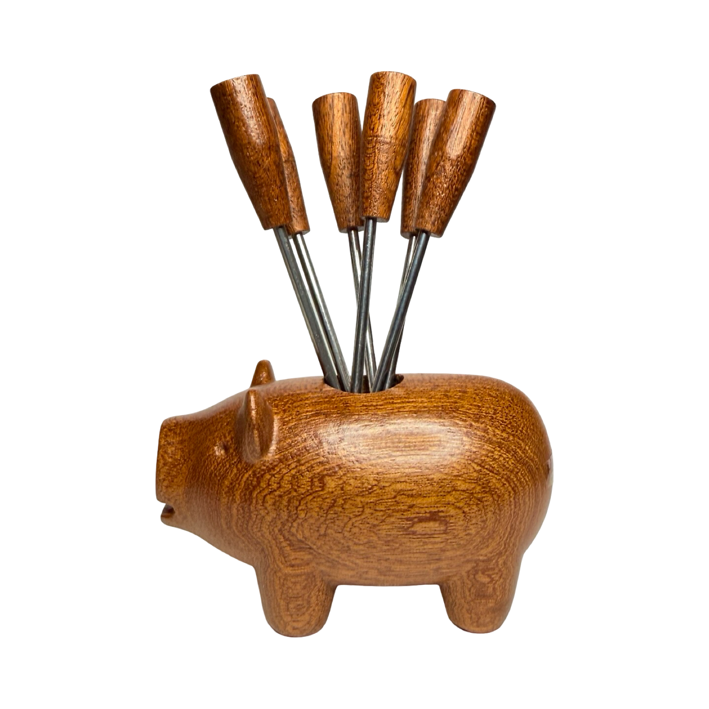 Wooden pig-shaped holder with six stainless steel appetizer picks featuring wooden handles.