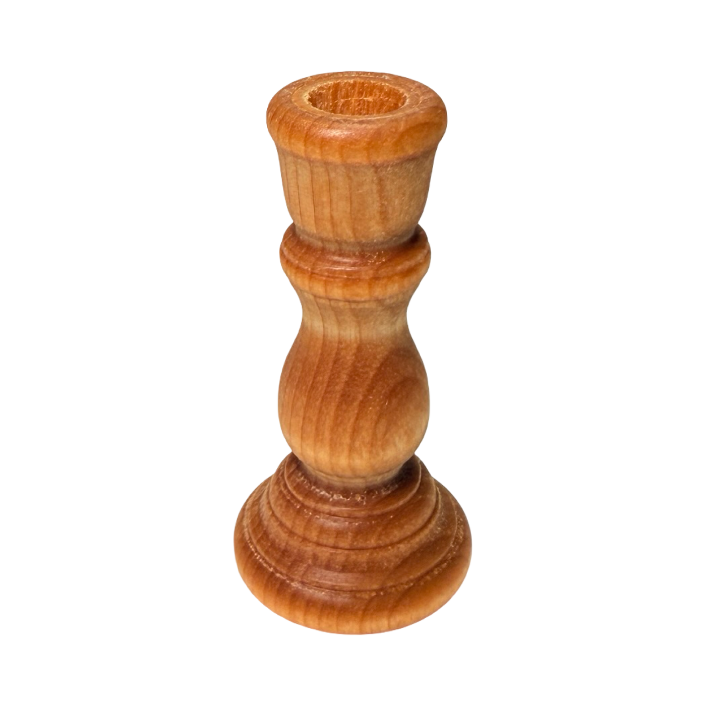 Small wooden candle holder with a smooth natural finish and rounded base, designed for taper candles.