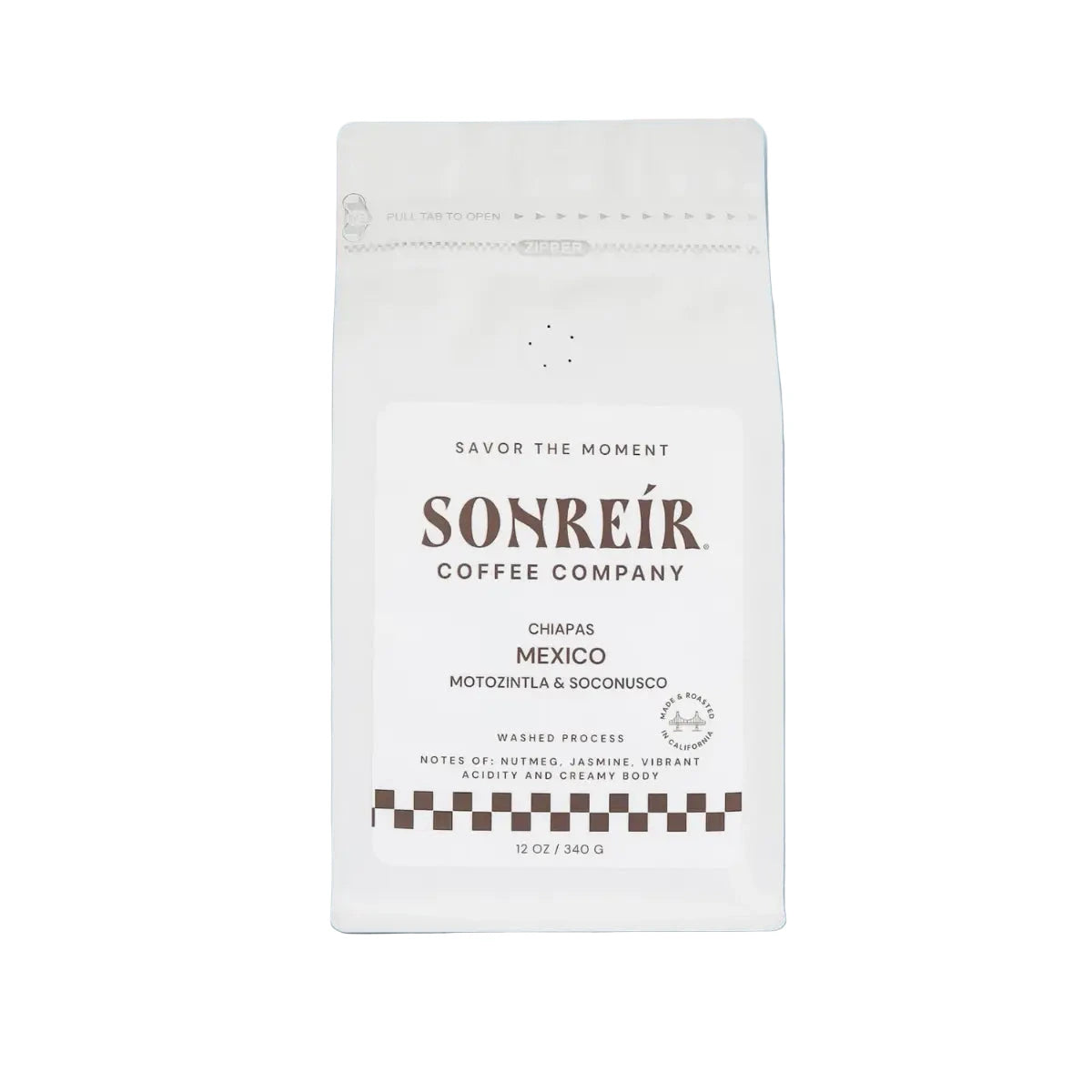 12 oz white pouch of Sonreir coffee - Chiapas whole beans.