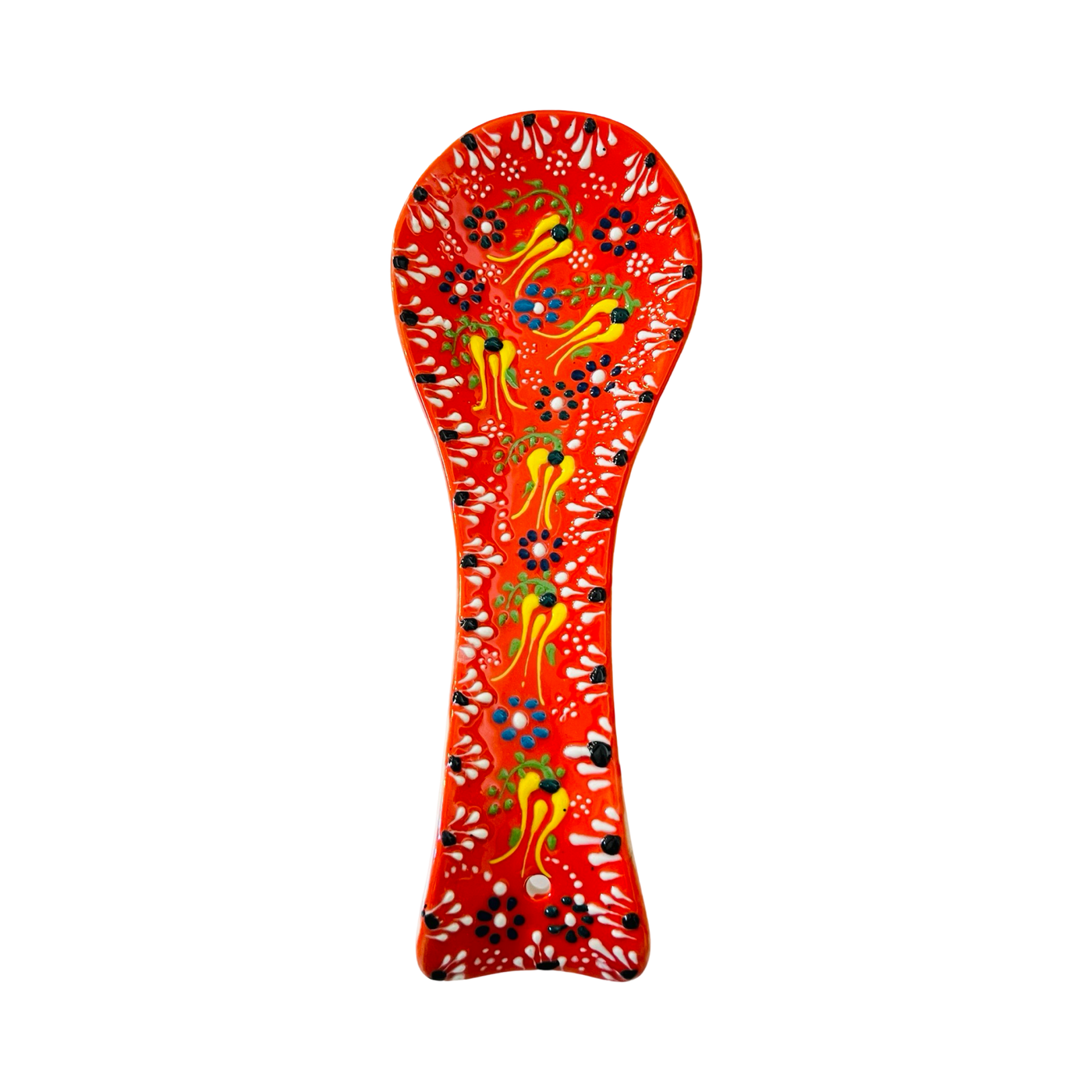 Orange spoon rest with a multi-color design